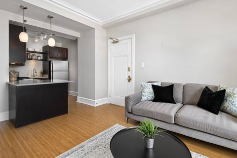 a living room with a couch and a table